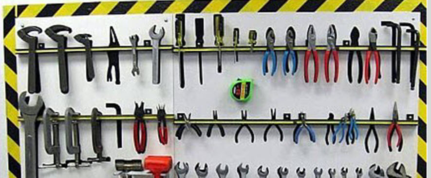 Tools neatly stored on 5S magnetic holders are easy to find and use