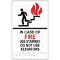 White ADA Braille IN CASE OF FIRE USE STAIRWAY DO NOT USE ELEVATOR Sign with Symbol RRE-265_MULTI_Black_on_White