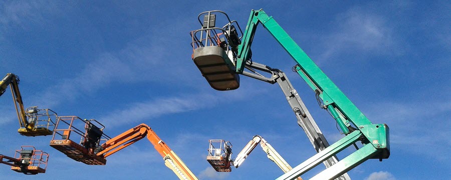 boom lifts extended to height