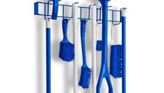 color-coded cleaning tools and rack