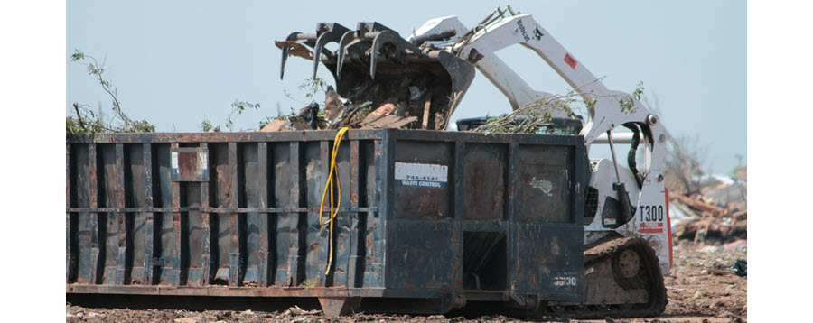 Trash dumpster on construction site