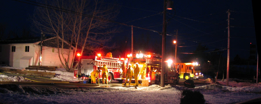 firefighters at fire scene