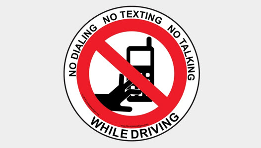 No phone use while operating vehicle label