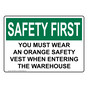 OSHA SAFETY FIRST You Must Wear An Orange Safety Vest Sign OSE-35978