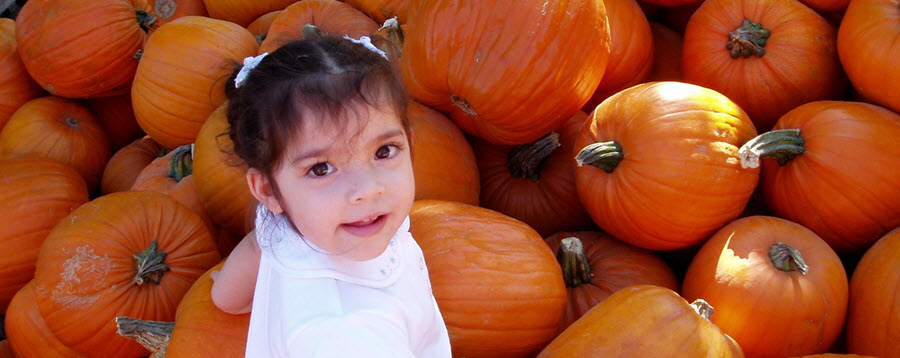 girl with pumpkins