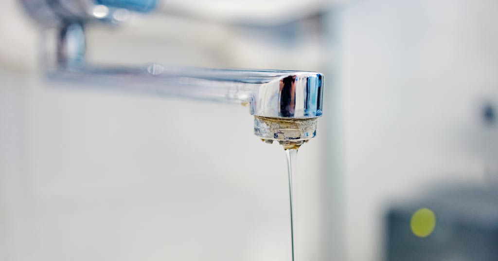 Student drinking water contaminated with lead.