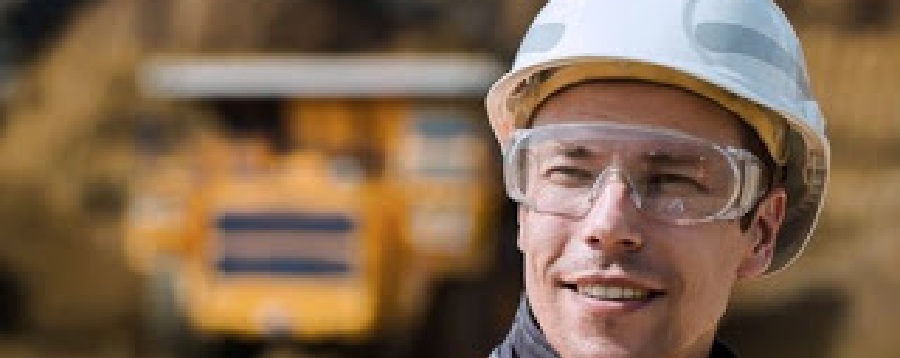 smiling worker, dump truck