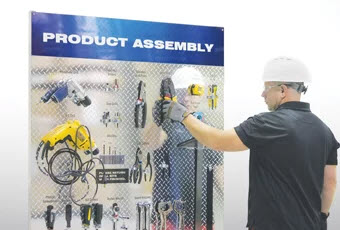 worker at tool board