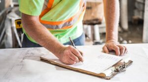 Industrial worker with safety checklist